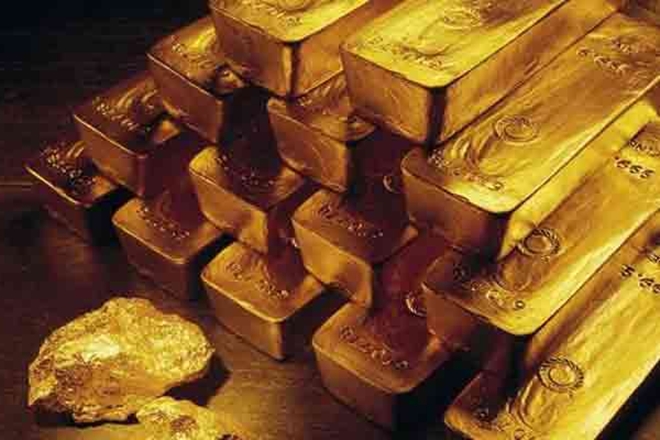 Gold pauses post US Fed decision; higher interest