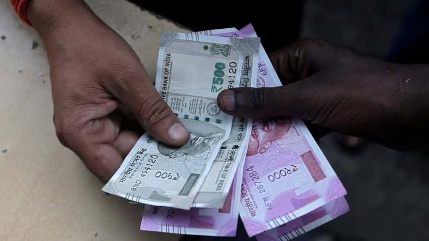 Rupee surges by 19 paise to 75.97 against US dollar