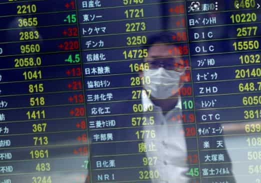 Asian stocks in defensive mood on China and rate worries