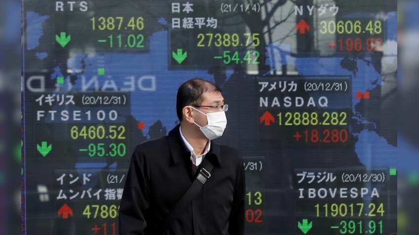 Asia stocks edge down after Wall Street falls; oil rises