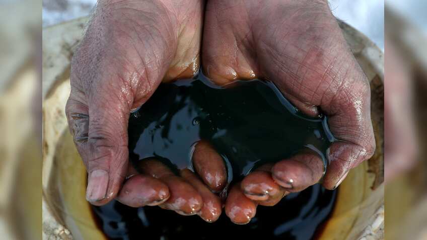 When will government consider lowering windfall tax as global oil prices decline?