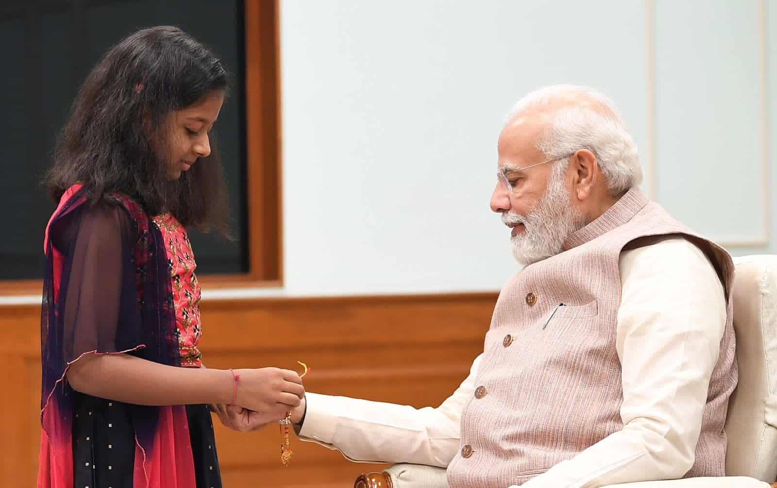  PM Modi celebrated Raksha Bandhan with the daughters of staff members 