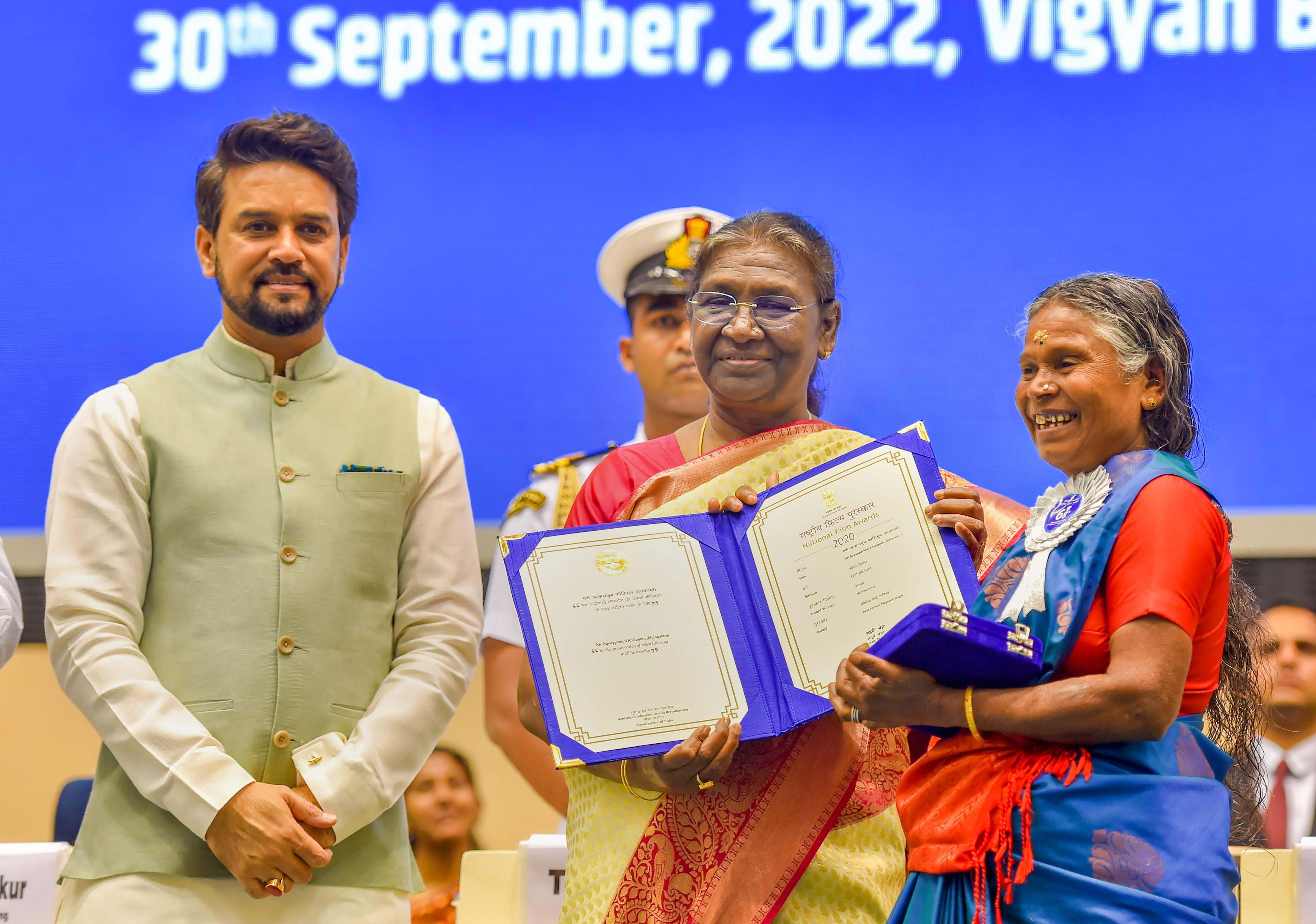 President Droupadi Murmu presents Best Female Playback Singer Award to Keralite tribal folk singer Nanjiyamma during the 68th National Film Awards presentation ceremony (PTI photo)