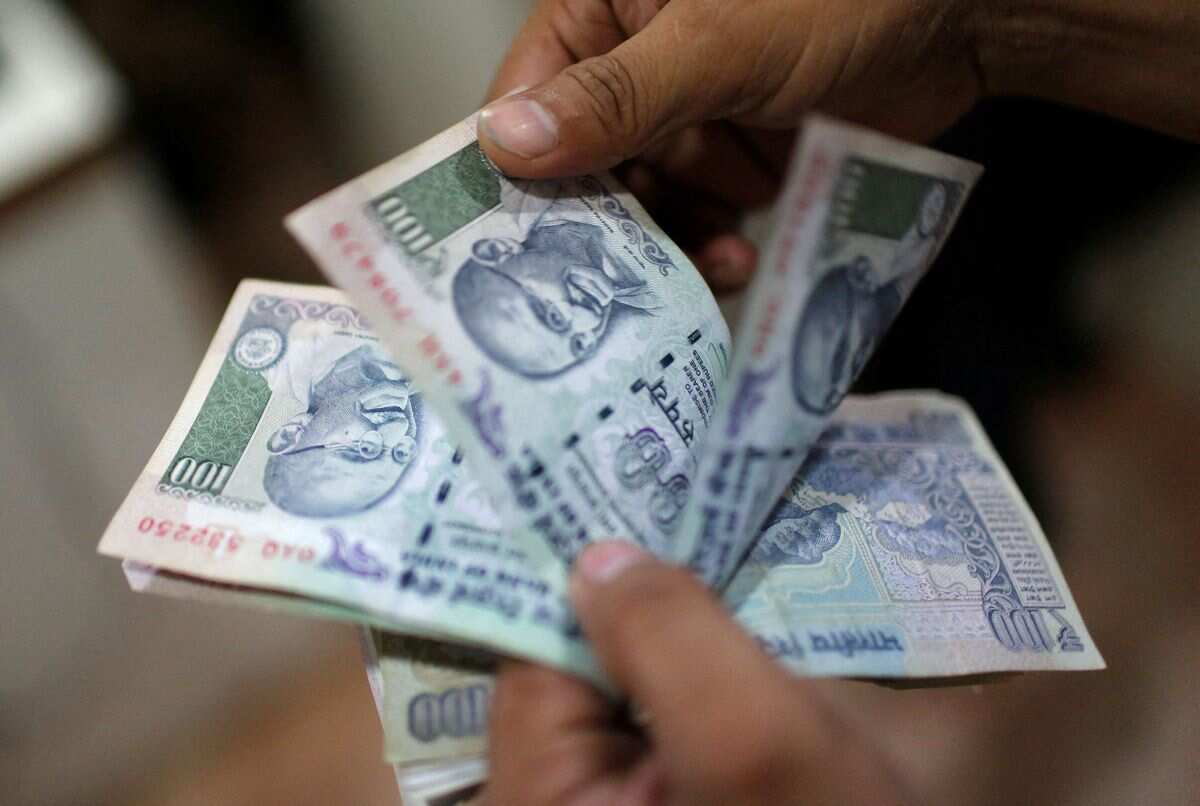 Rupee vs dollar: INR falls to 82.45 versus USD