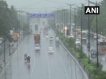 Mumbai weather alert: Heavy unseasonal rain brings temperature