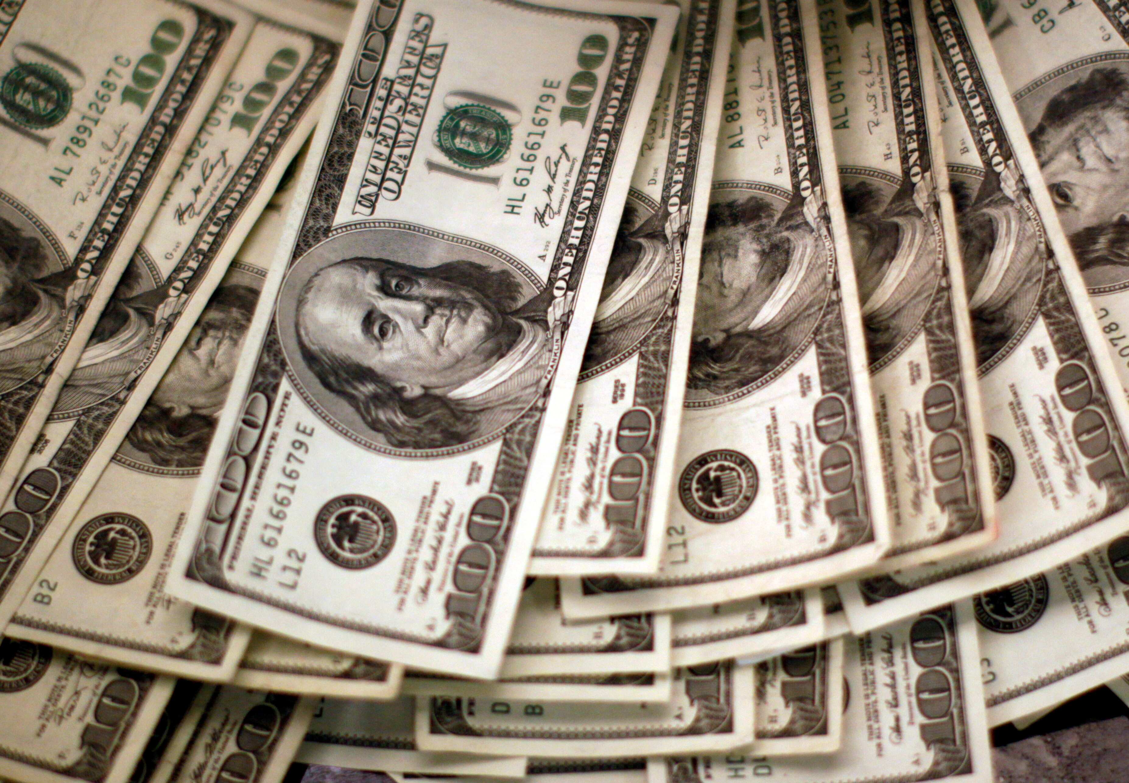Dollar index dips as job openings fall, US Fed meeting in focus