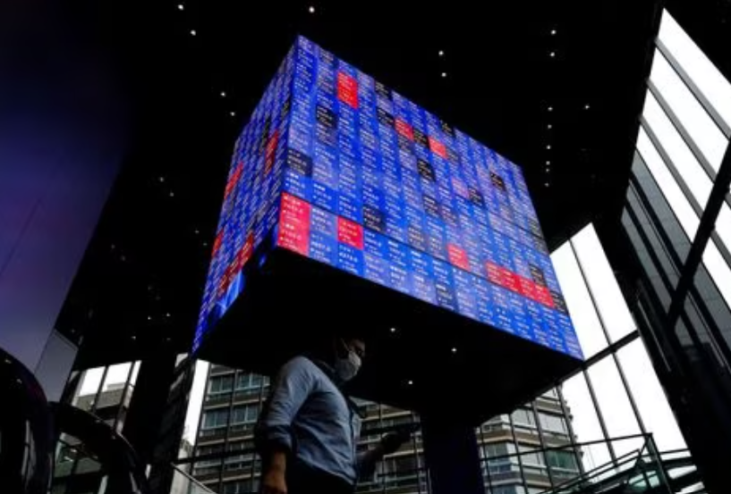 Japan's Nikkei hits highest since July 1990 on weak yen, US optimism