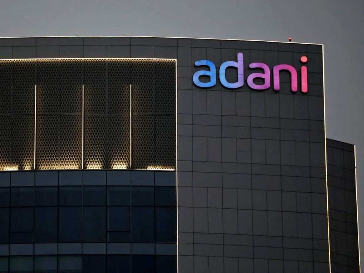 Adani Green Energy shares close higher after board approves raising Rs 12,300 crore via QIP