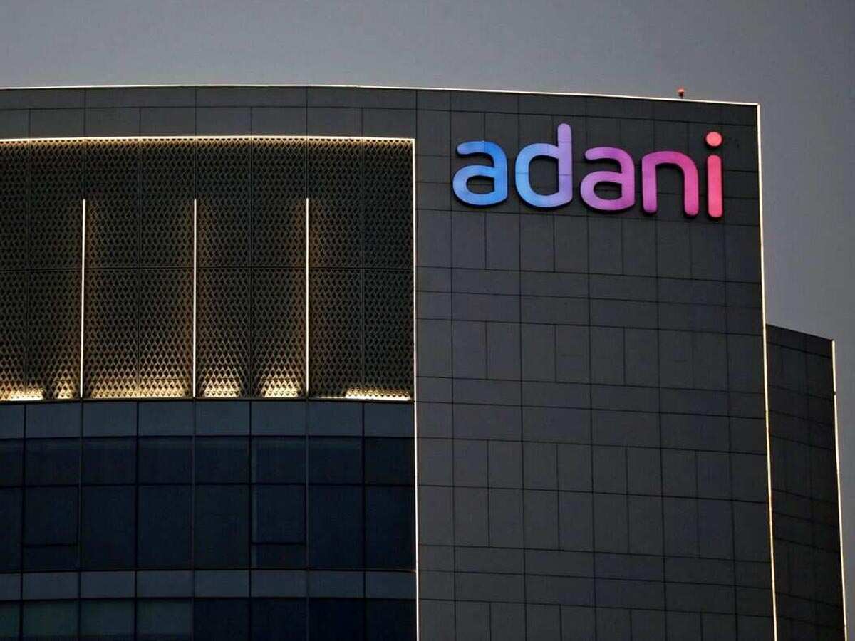 Adani Green Energy shares close higher after board approves raising Rs 12,300 crore via QIP