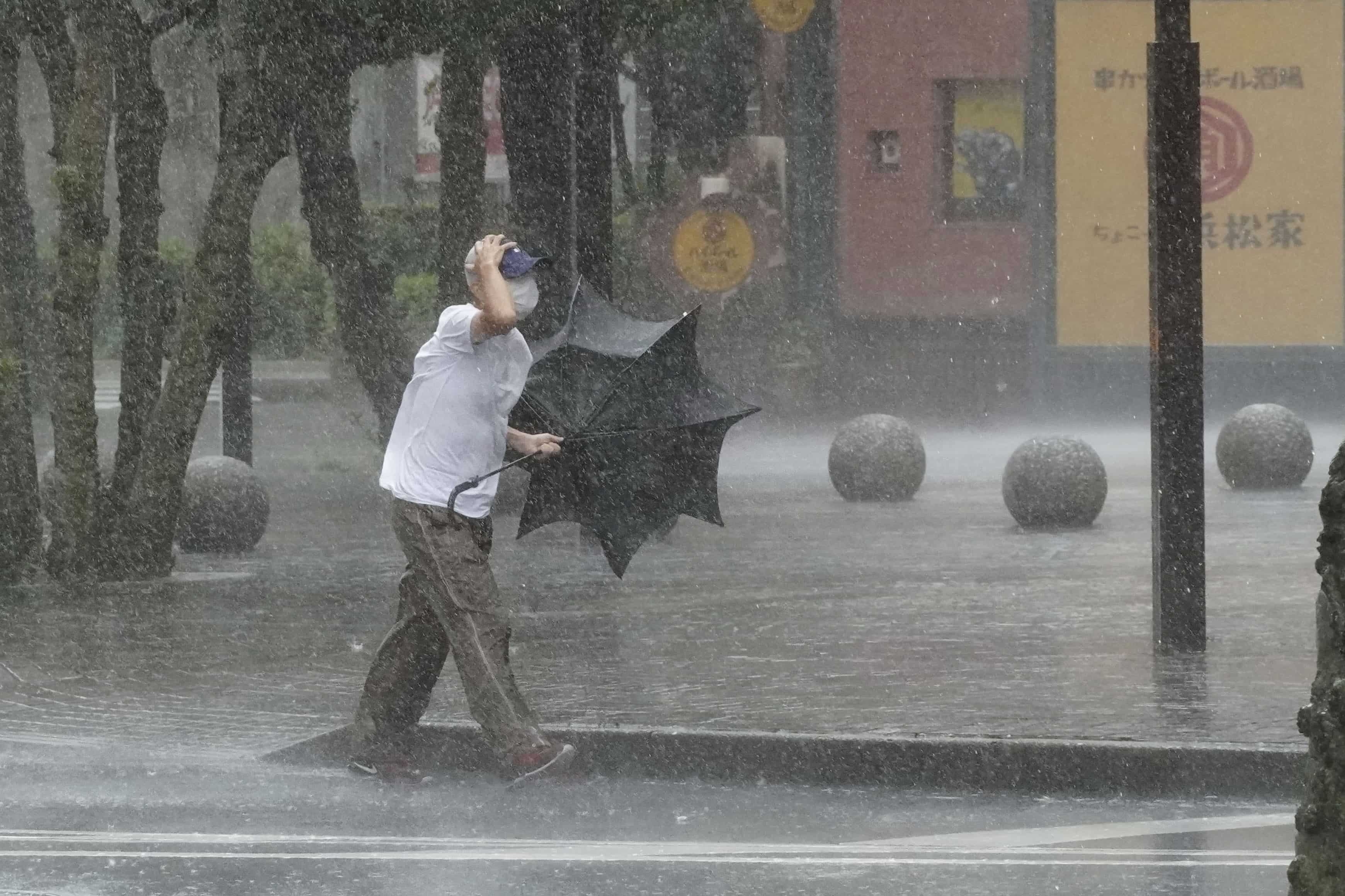 Heavy rainfall in western Japan halt bullet train services