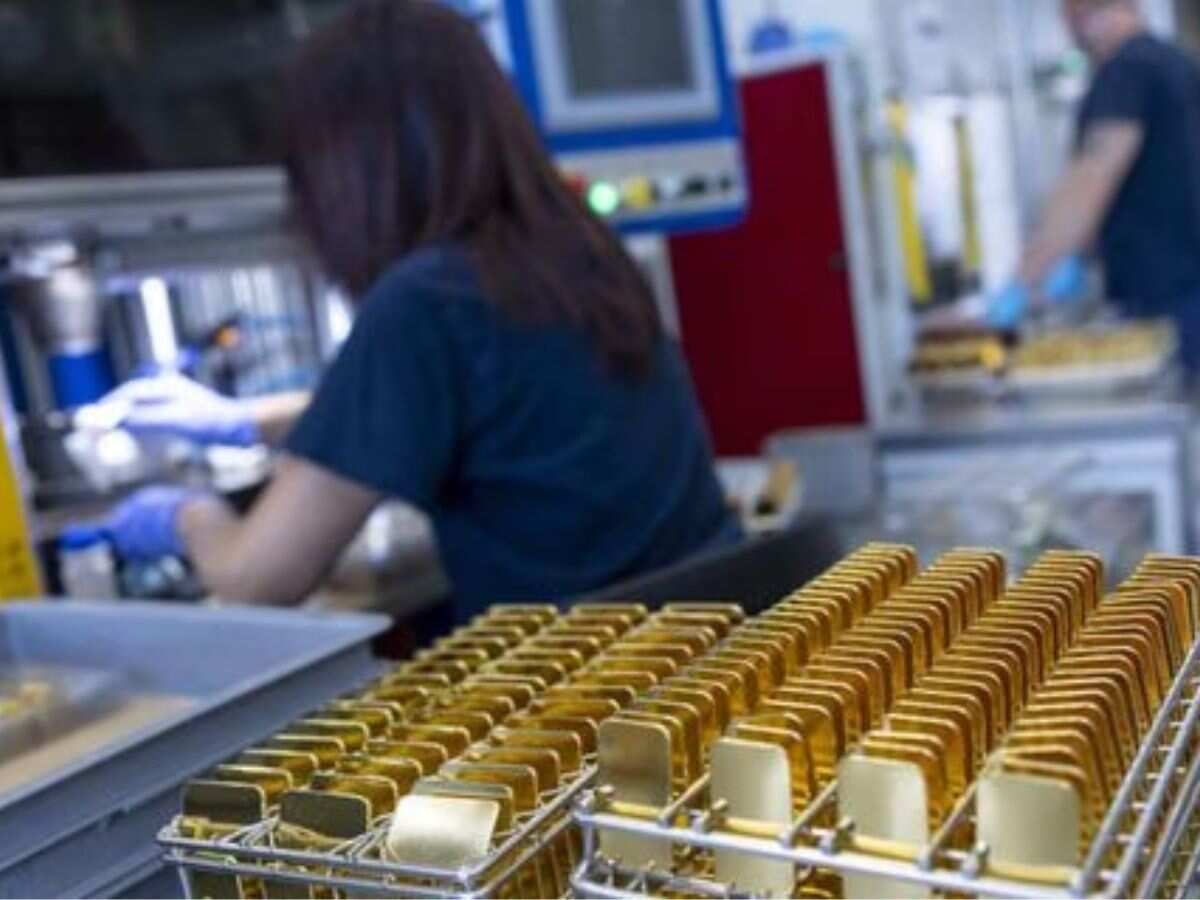 Gold gains as dollar, yields slip ahead of US inflation data