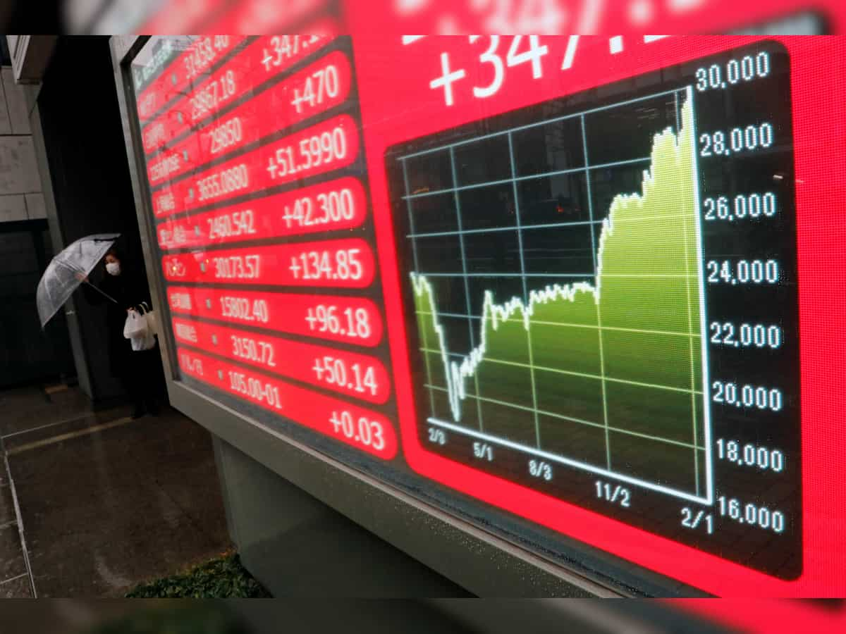 Asian markets softer as investors look to key inflation readings