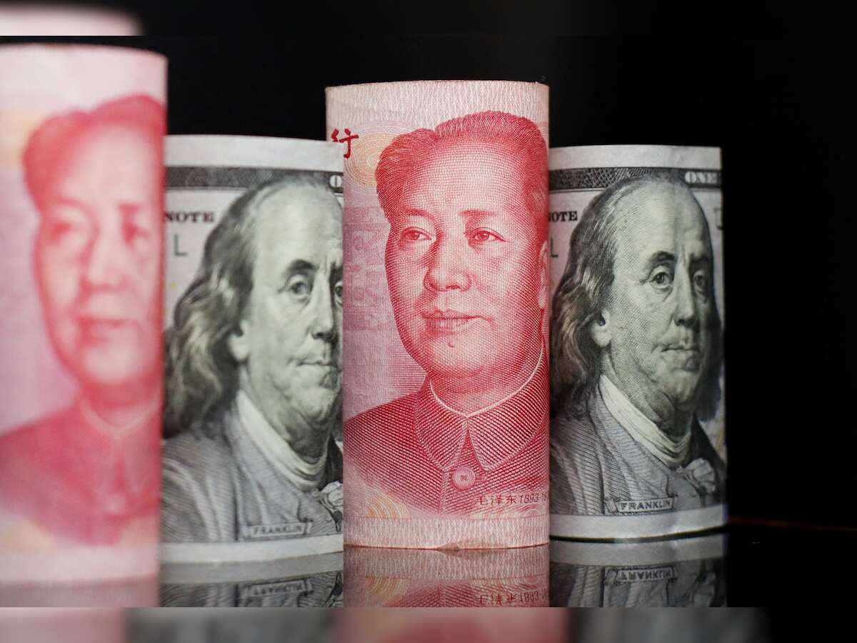 Dollar set for fifth winning week on Fed bets, PBOC supports yuan