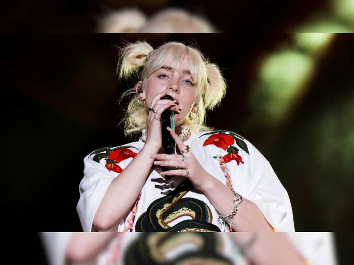 Billie Eilish flies in economy on commercial airline, gets praised