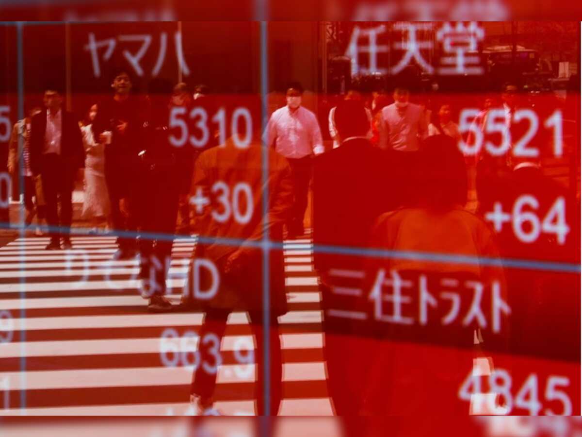 Asian shares hit two-week high on Fed pause bets, China boost
