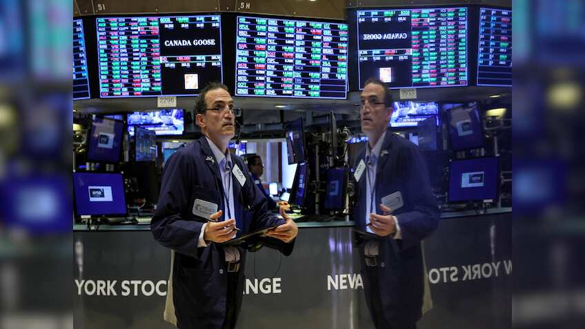 Wall Street gains, dollar softens as weak data signals Fed pause