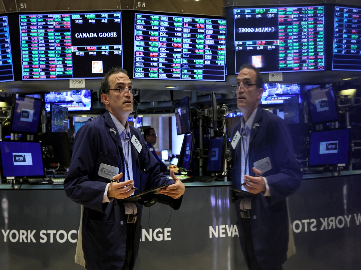 Wall Street gains, dollar softens as weak data signals Fed pause