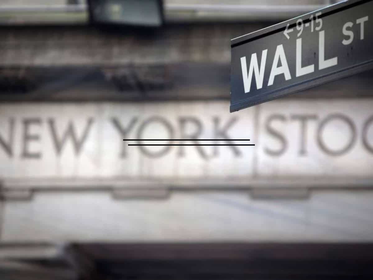 Wall Street slips as Treasury yields rise, oil prices boost energy sector