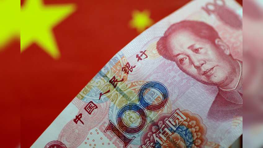 China's offshore yuan weakens after reserve requirement ratio cut