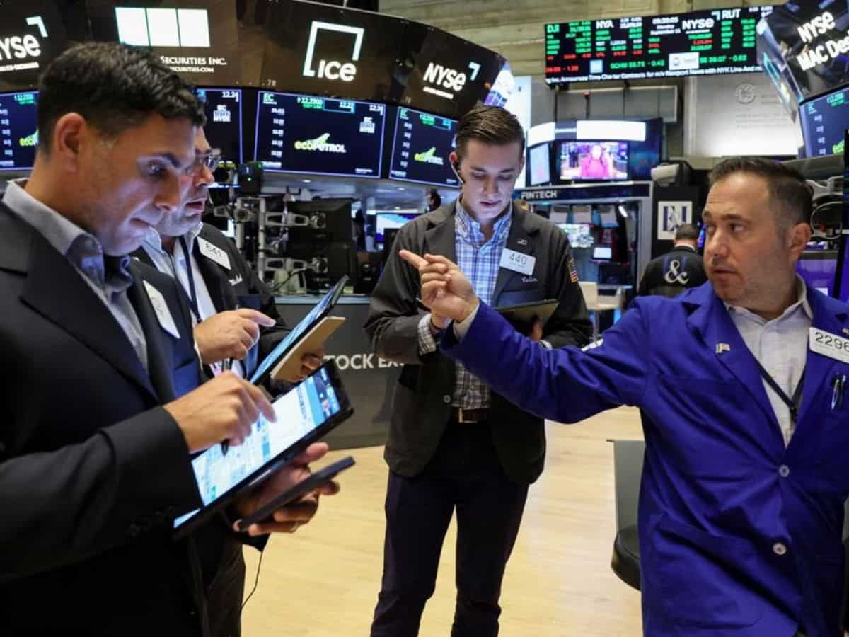 Wall Street ends higher on economic data; Arm soars in debut