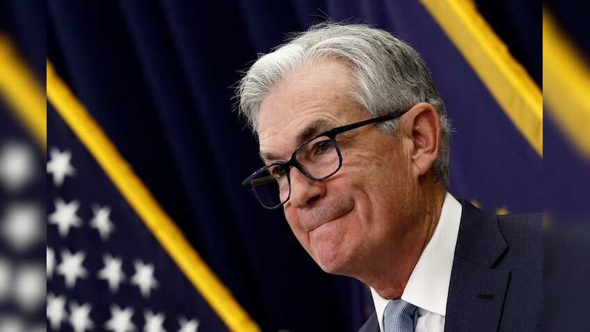 Fed keeps rates steady, toughens policy stance as 'soft landing' hopes grow