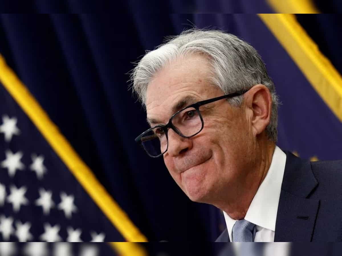 Fed keeps rates steady, toughens policy stance as 'soft landing' hopes grow