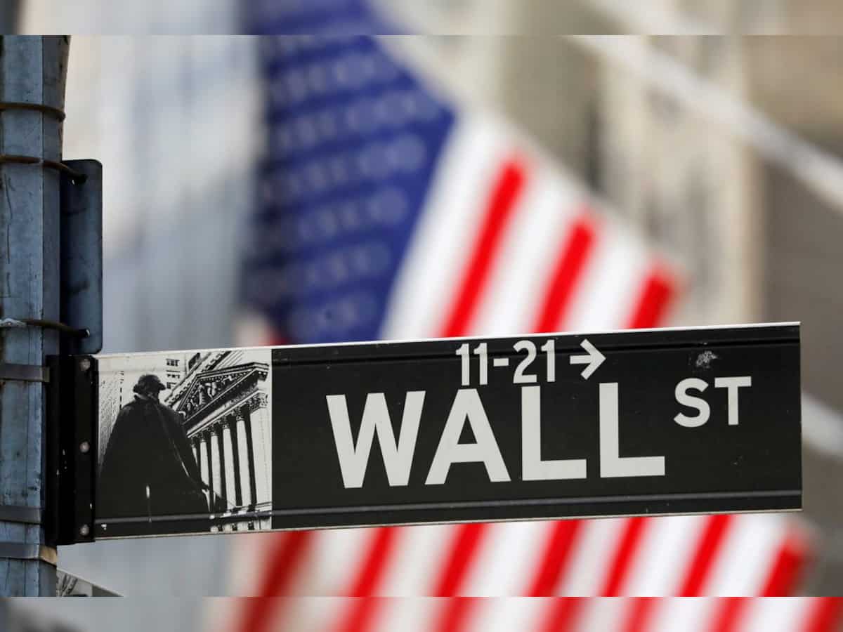 Wall Street closes lower after Fed holds rates steady, warns of higher for longer