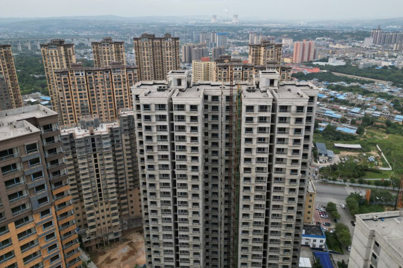 Even China's 1.4 billion population can't fill all its vacant homes, former official says