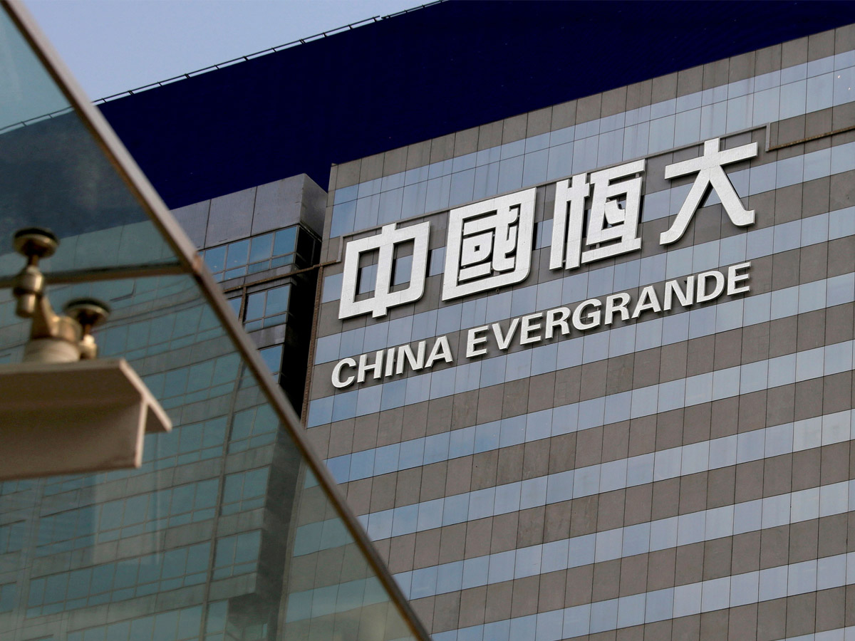 Evergrande shares sink after saying it is unable to issue new debt