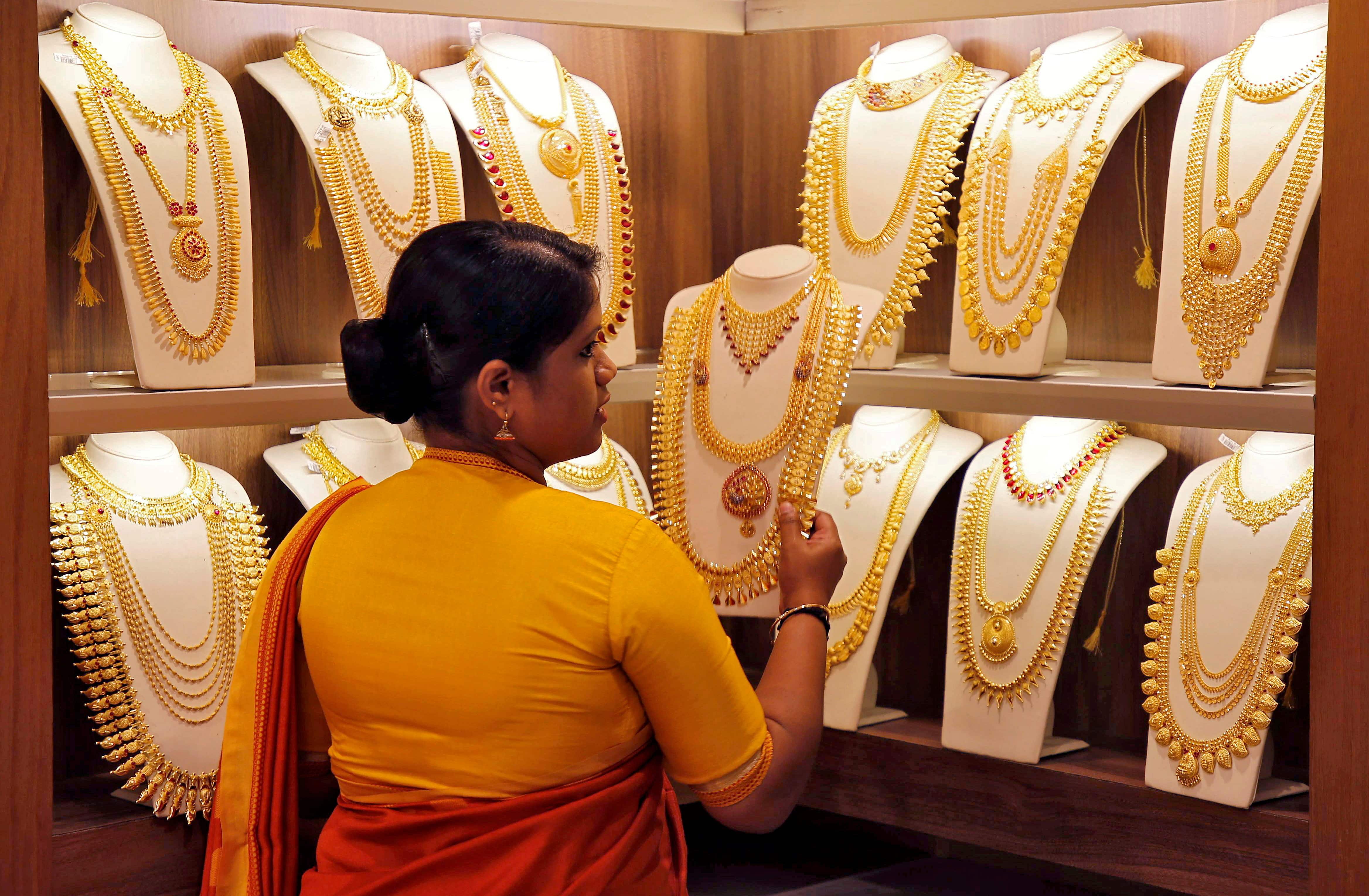 Gold and silver prices today: Yellow metal inches lower as dollar  strengthens - BusinessToday
