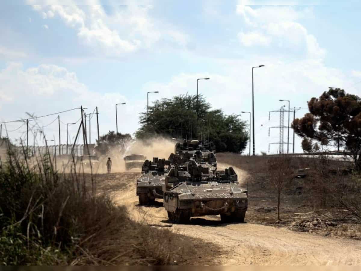 Gaza-Egypt border crossing set to reopen as Israeli troops prepare ground assault