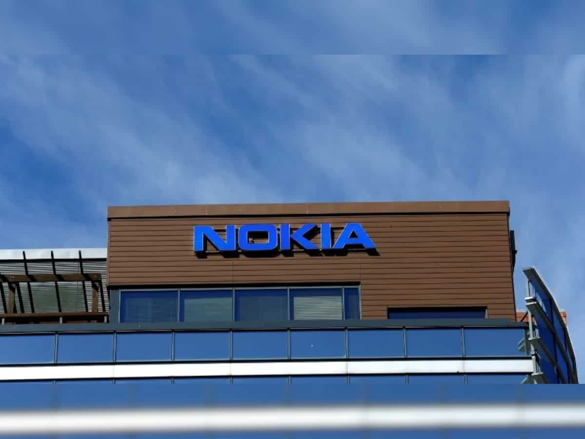 Nokia to axe 14,000 jobs as profit plunges