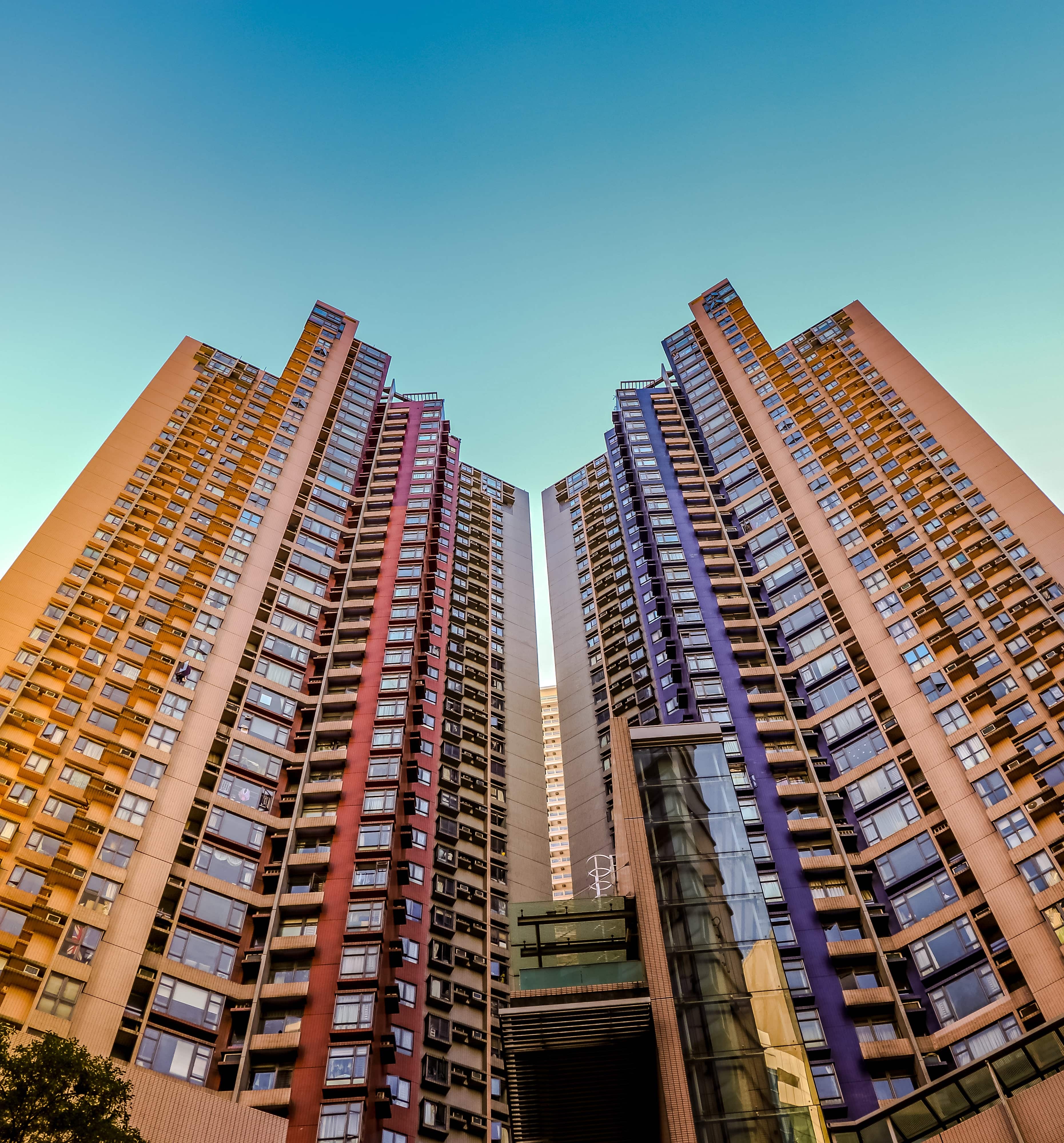 Hong Kong cuts taxes for foreign home buyers and stock traders as it seeks to maintain global status