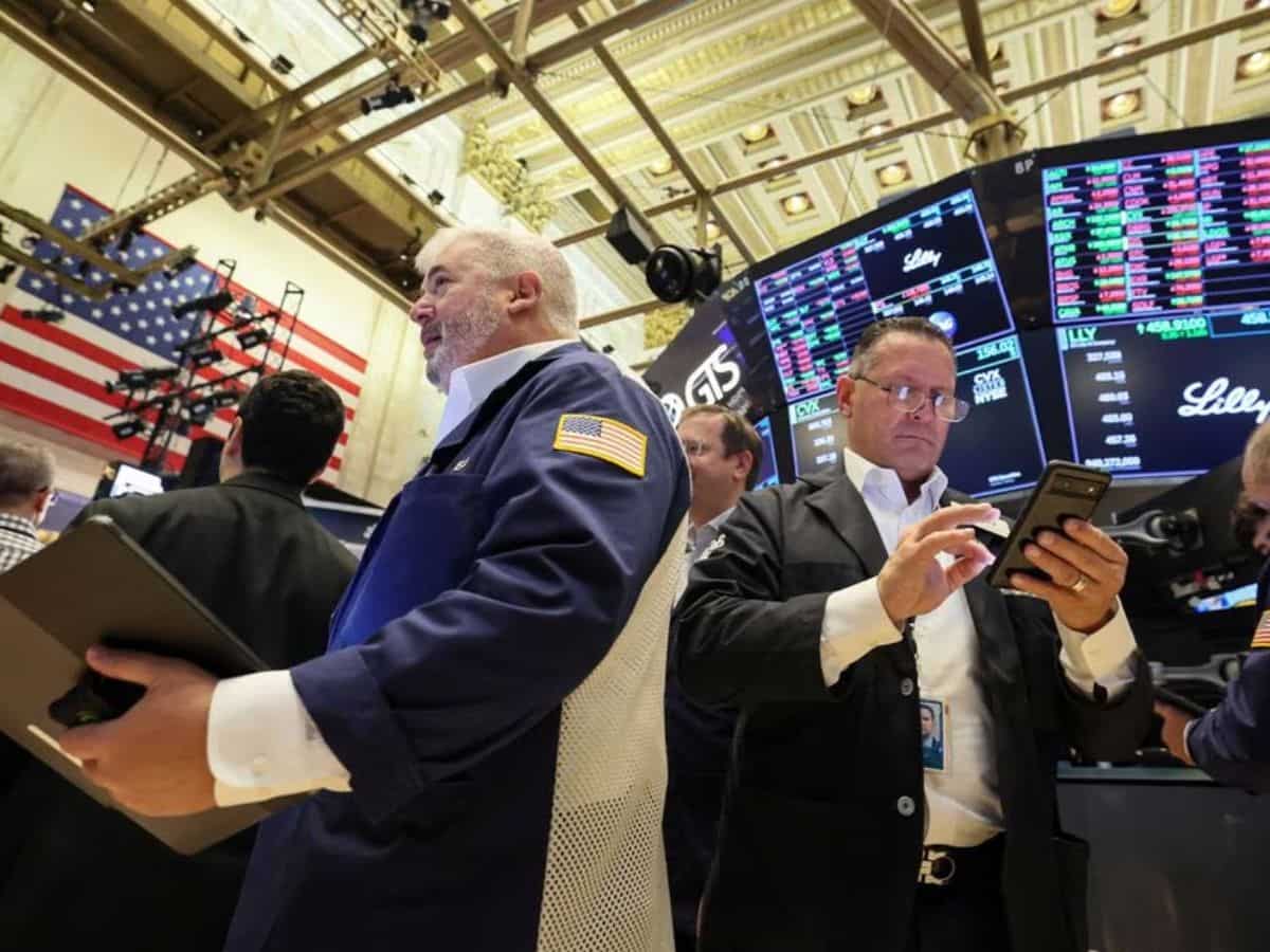 Wall Street ends sharply higher, powered by earnings momentum; Fed eyed