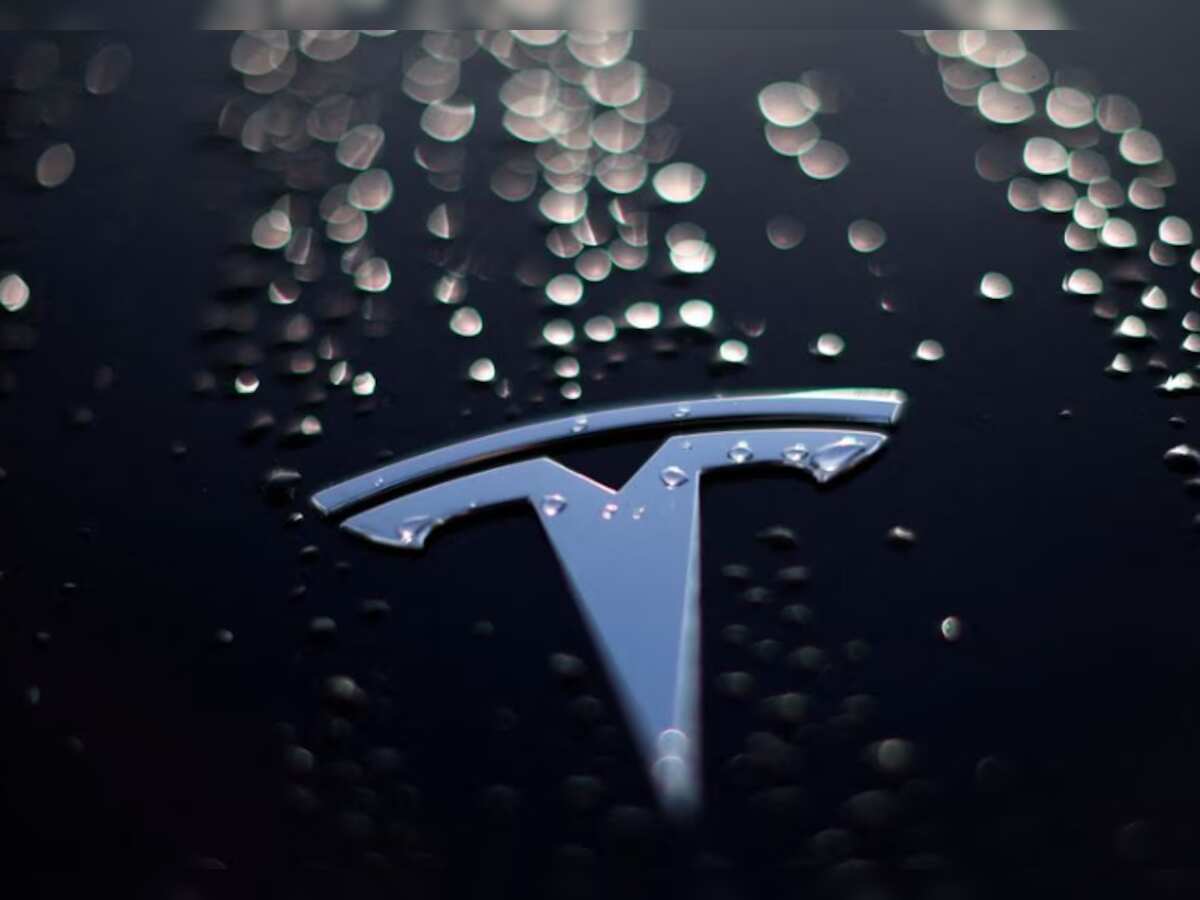 Tesla falls as production cut by battery supplier Panasonic fans EV demand fears