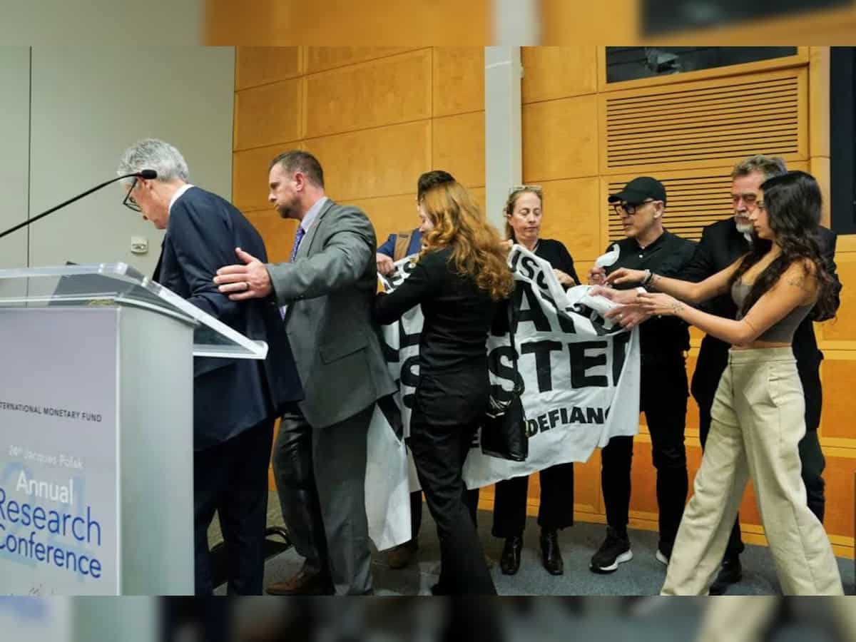 Climate activists briefly disrupt Fed chair's speech