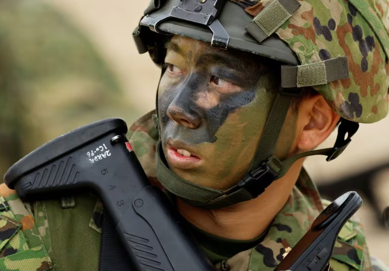 Japanese troops drill on island seen as vulnerable to China