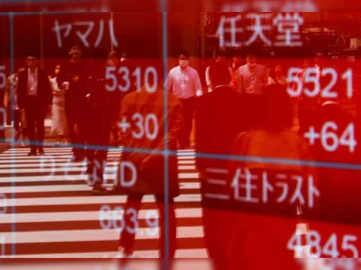 Japan shares hit three-decade high, yuan climbs