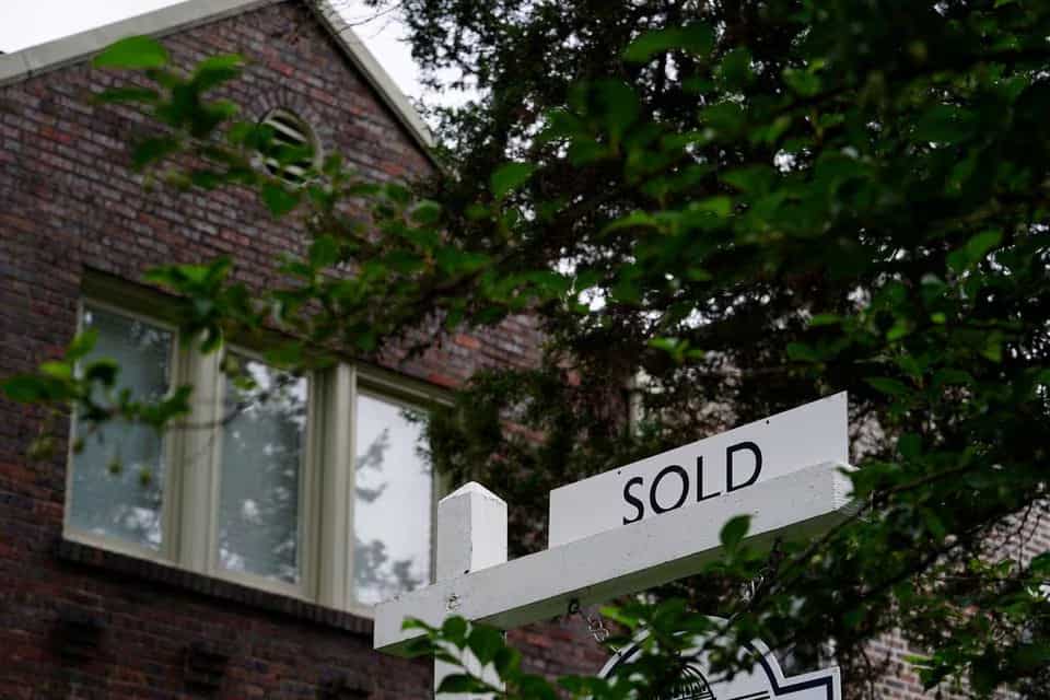 US existing home sales slump to more than 13-year low, prices accelerate