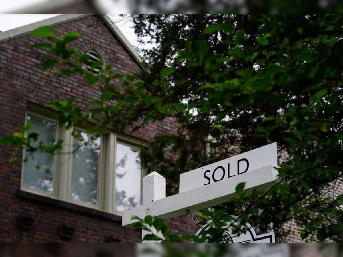 US existing home sales slump to more than 13-year low, prices accelerate