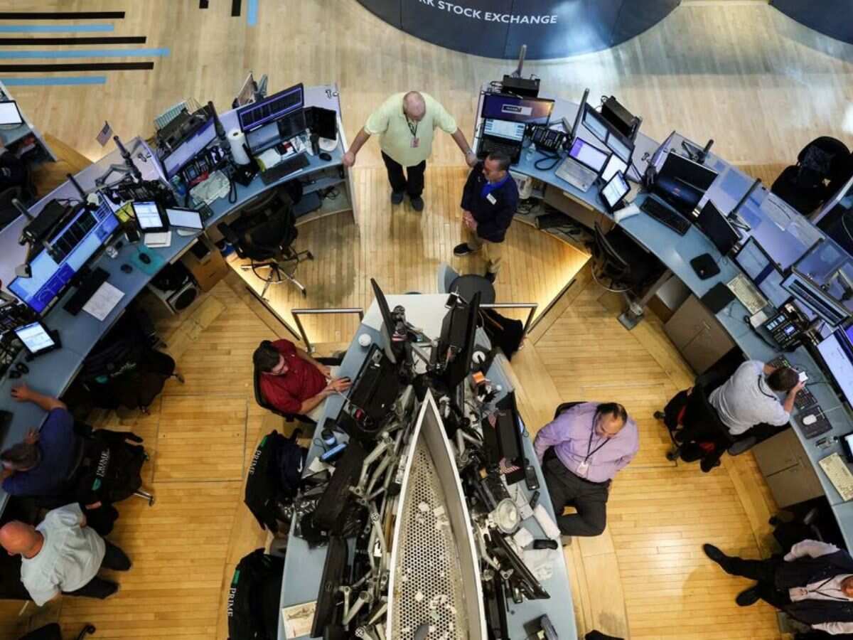 Wall Street ends down as megacaps give back gains