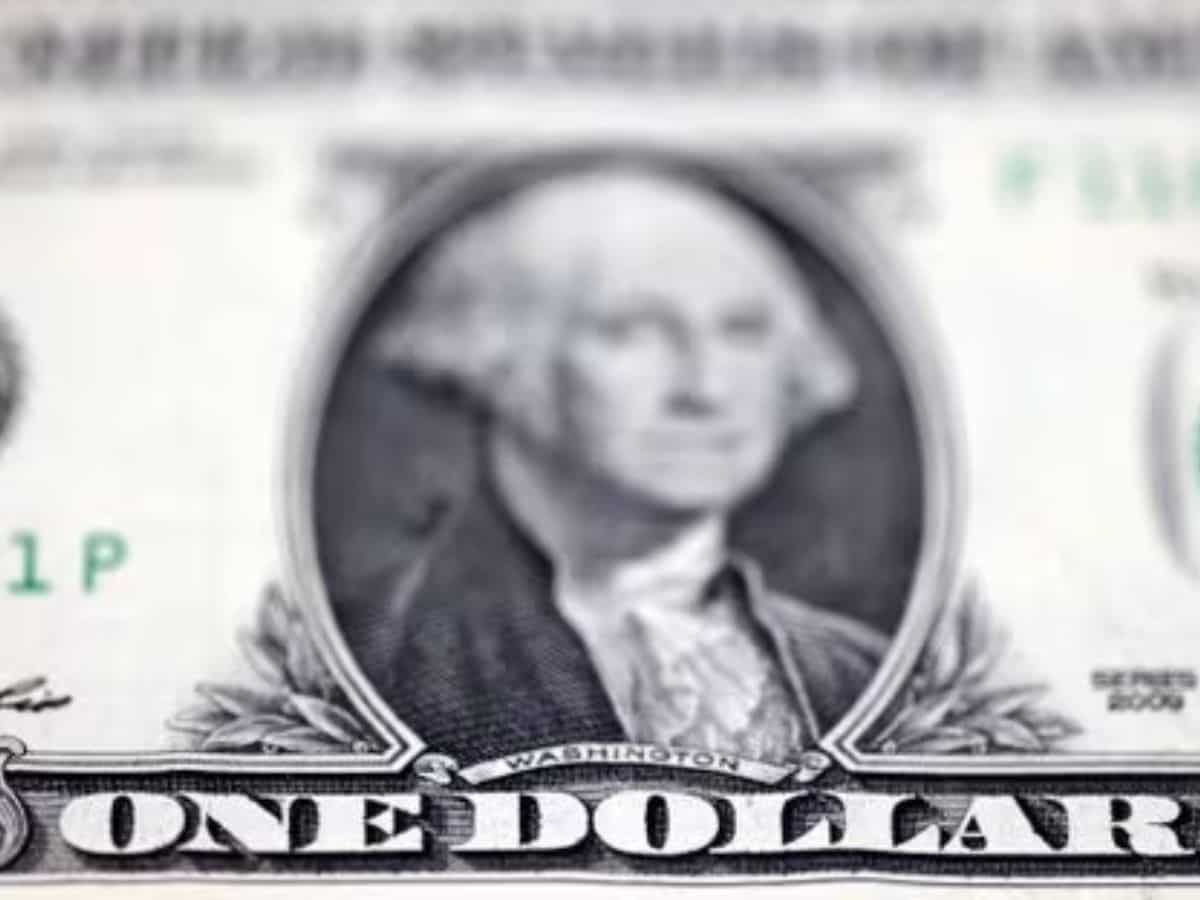 Dollar takes a dive after Fed signals rate cuts next year