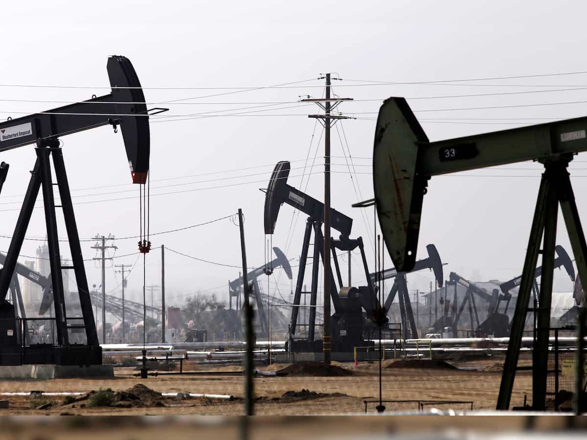 Oil drops slightly on China demand concerns but records weekly gain