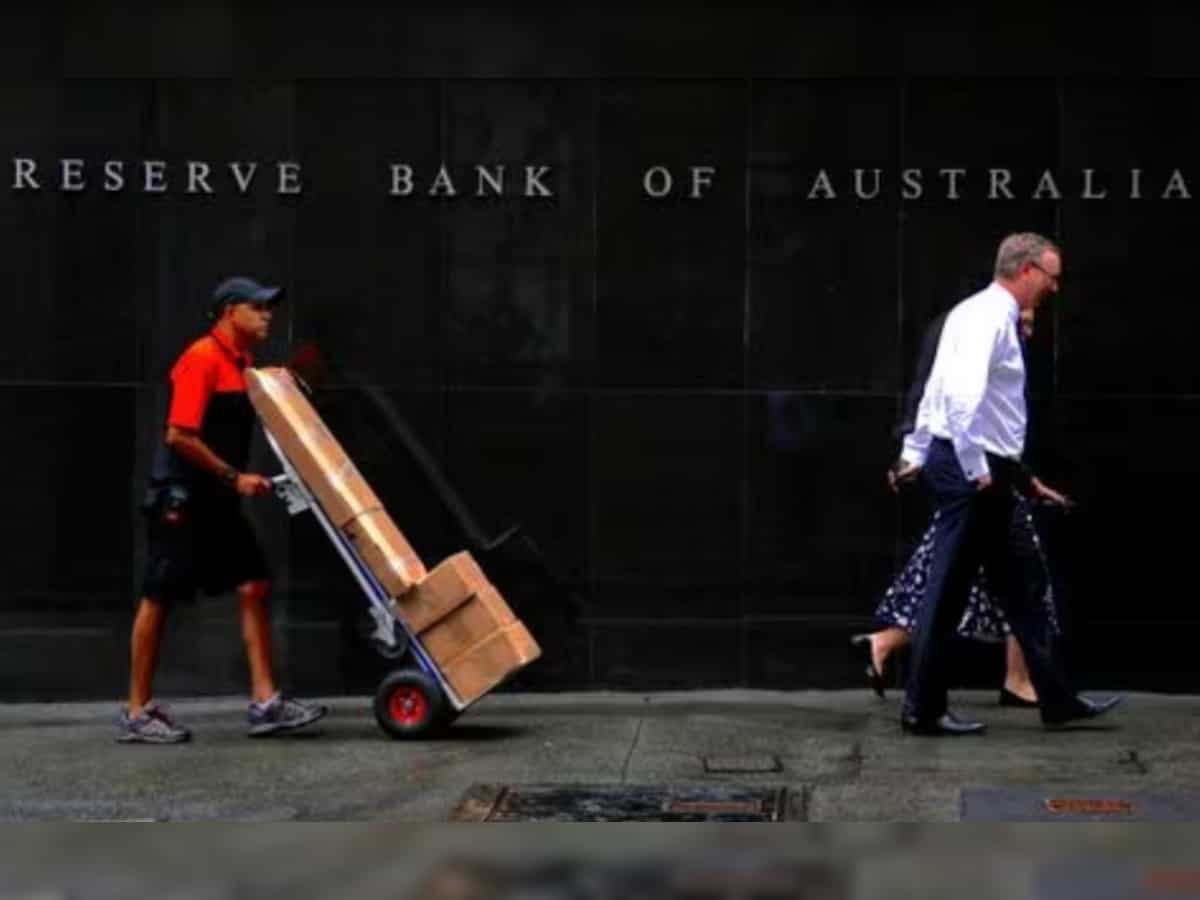 Australia's central bank holds rates, warns further hike might be needed