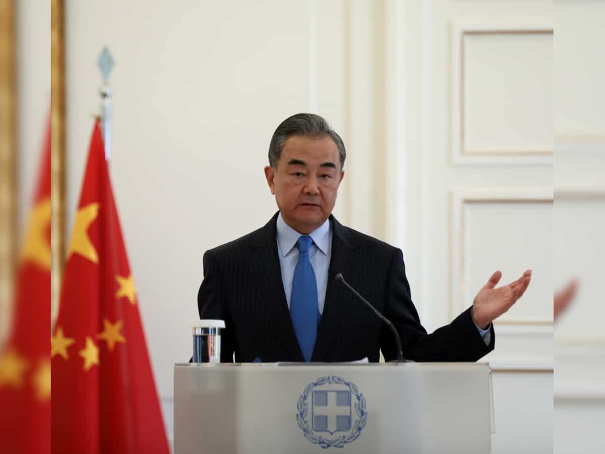 Chinese foreign minister says trying to cut his country out of trade would be a historic mistake