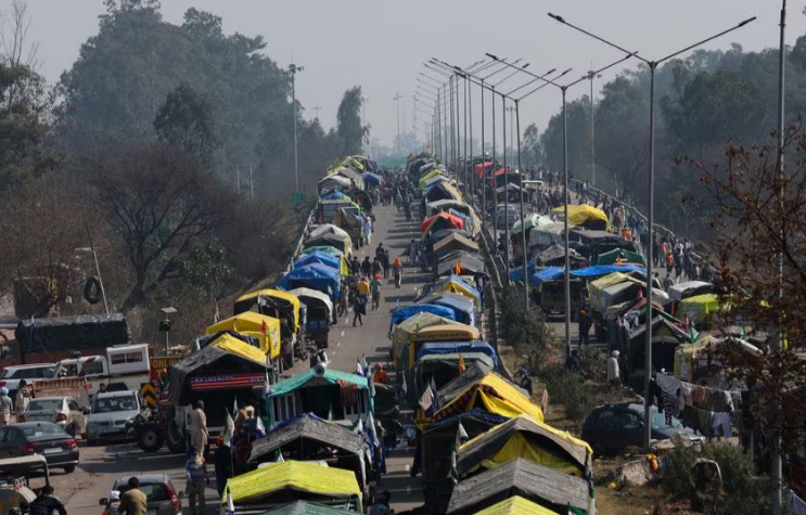 Farmers pause protest march to Delhi as government