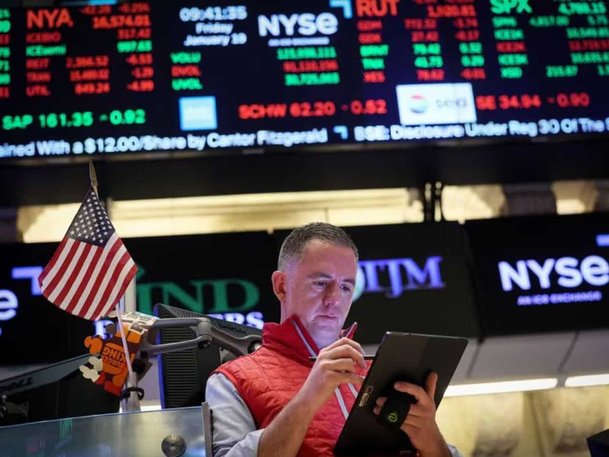 Stock market today: Wall Street rises to a record as it waits for