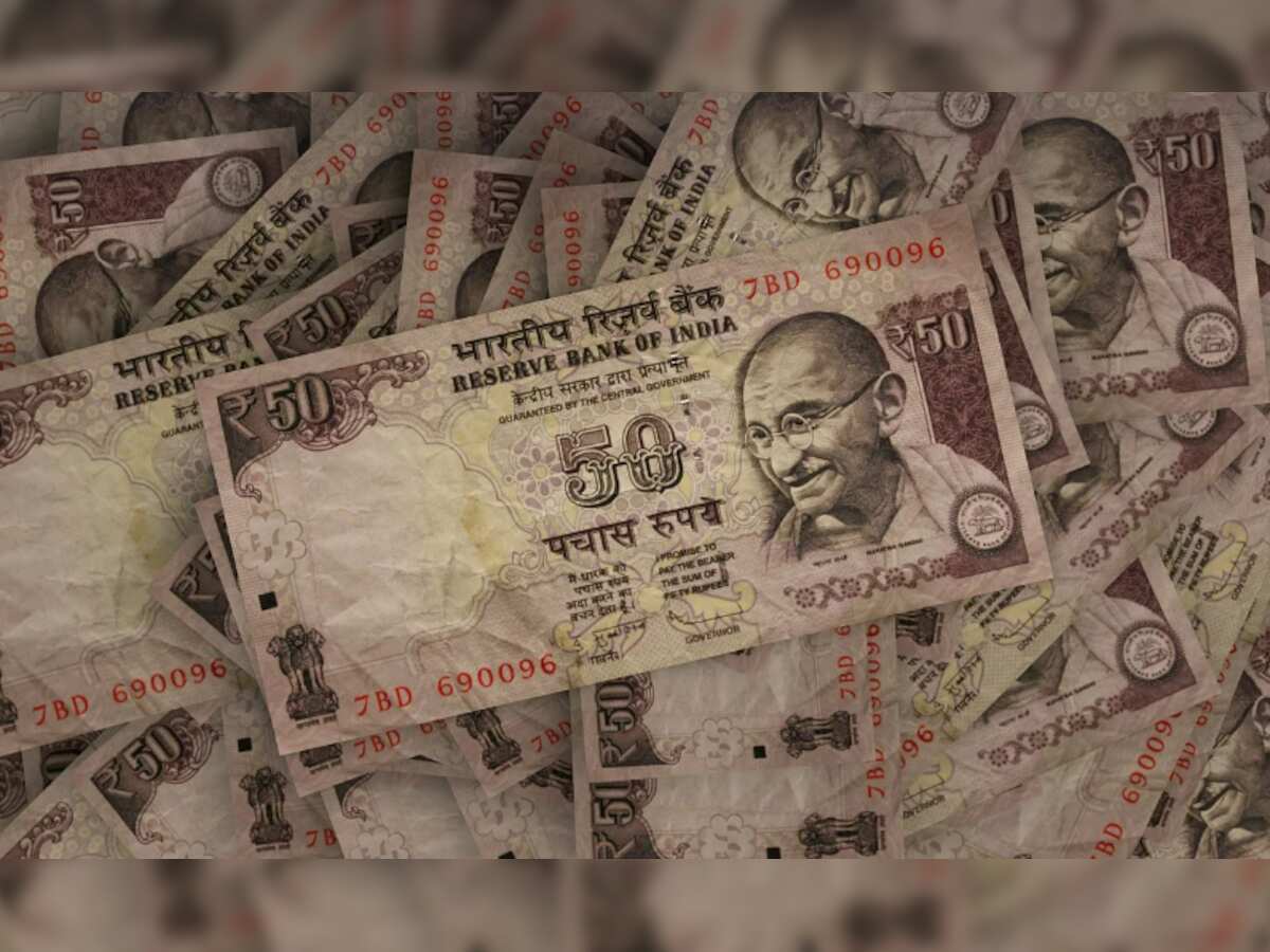 Rupee falls 4 paise to settle at 82.90 against dollar on firm crude oil prices