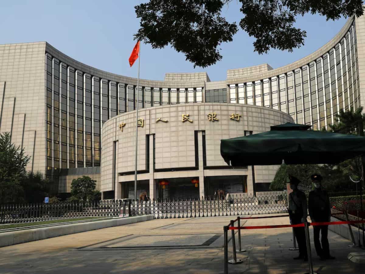 China central bank keeps policy rate unchanged, drains cash from banking system