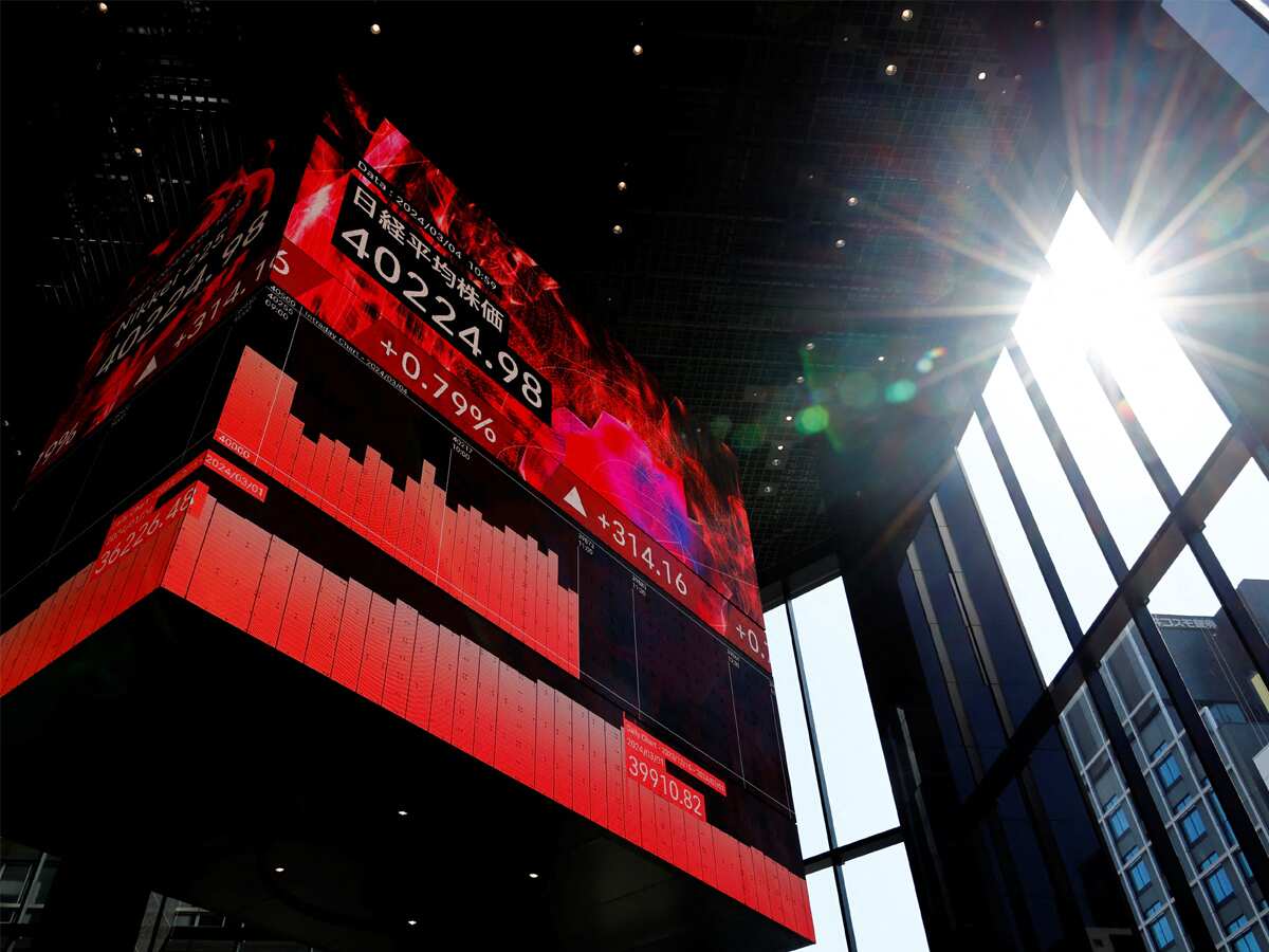 Asian shares mixed as Fed's Powell rethinks rate cuts, yields jump